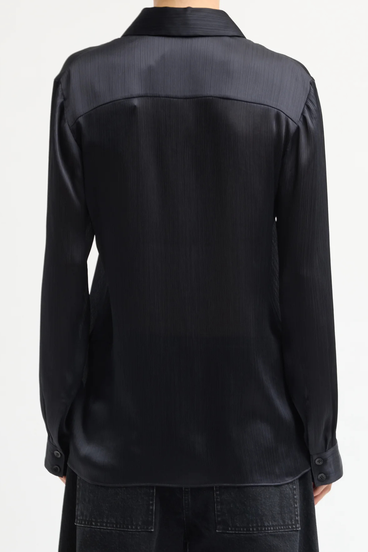 Tibi Matte Satin Plisse Slim Shirt in navy, featuring a slim silhouette and textured pleated matte satin fabric.