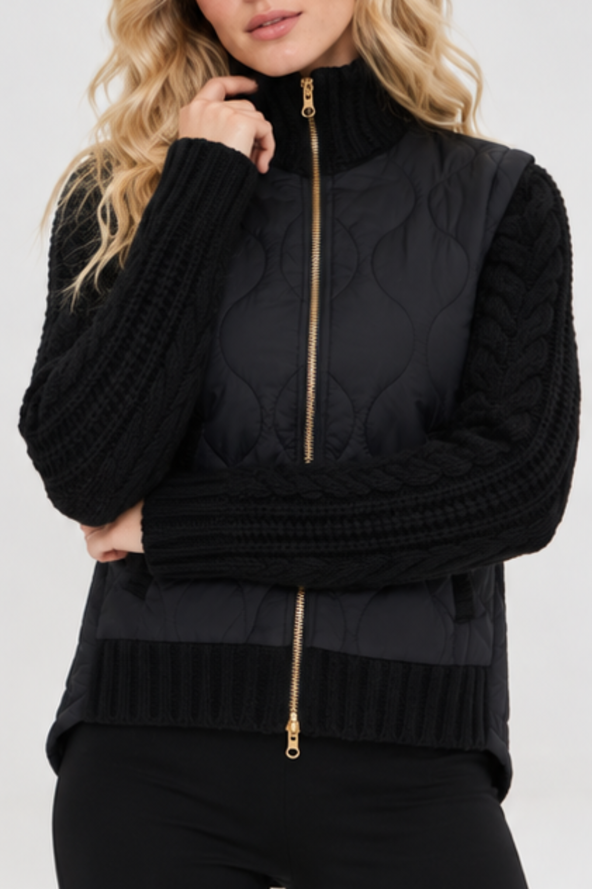 Patra black quilted jacket with wool-blend cable-knit sleeves and high-low hem