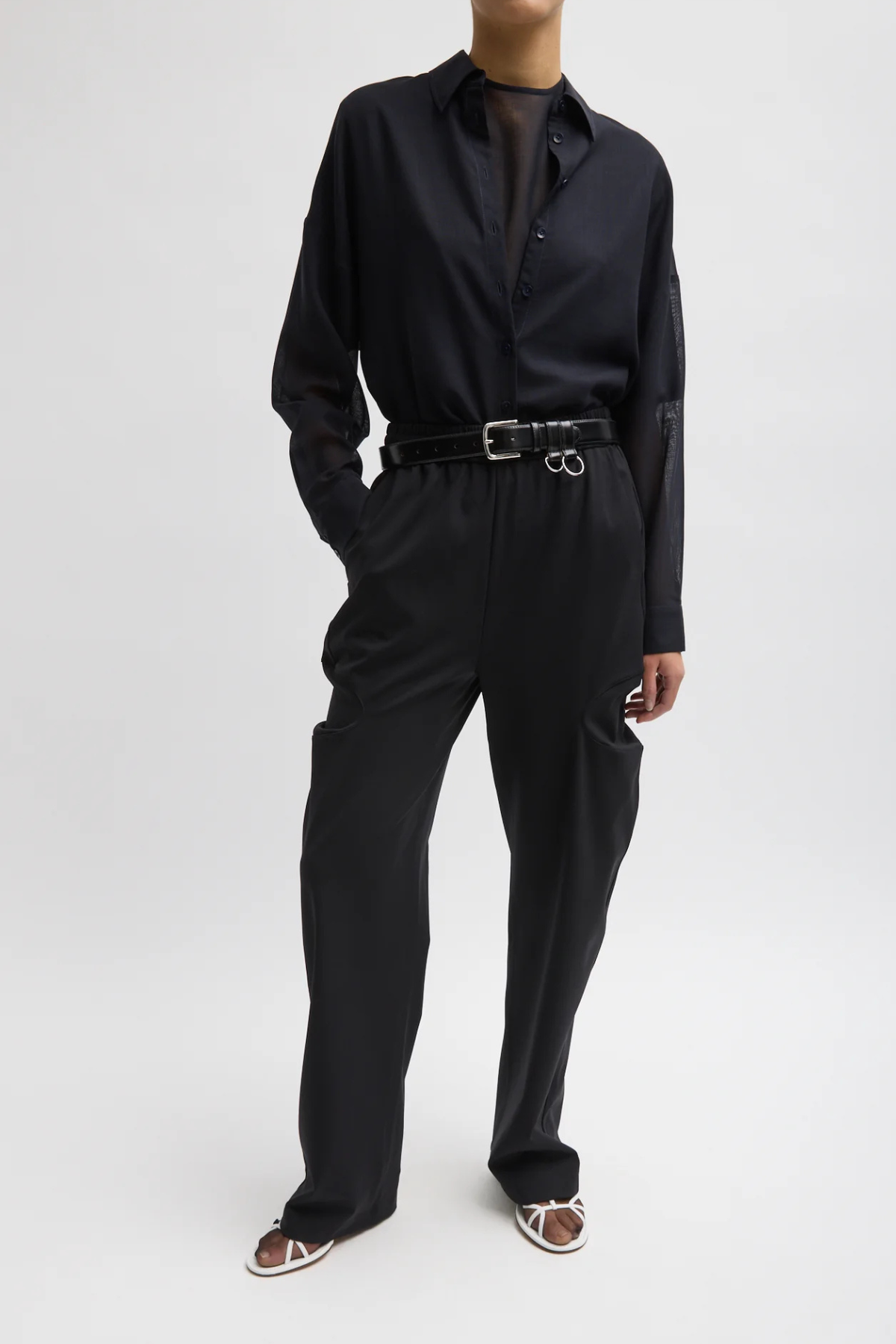 Tibi Classic Ring Hardware Leather Belt in Black with silver-tone buckle and removable D-ring loops