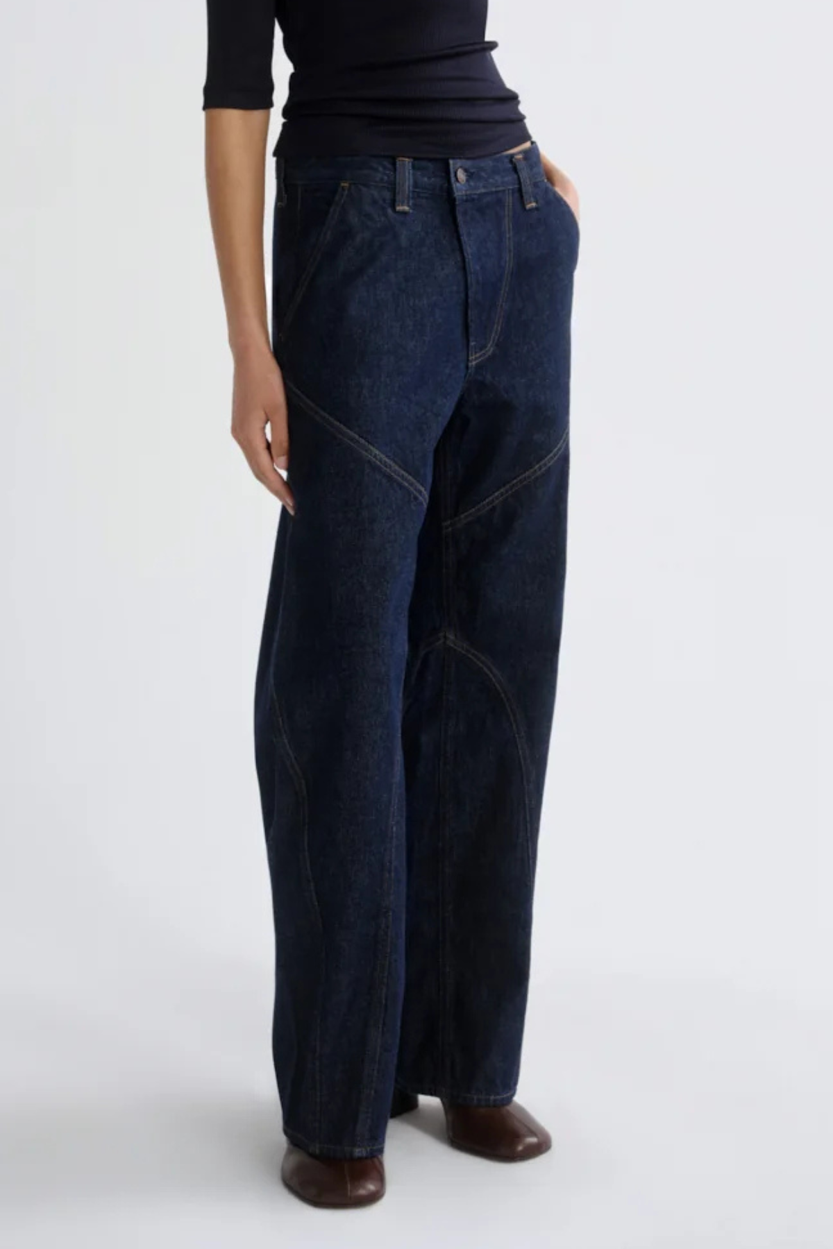 AGOLDE Reena Jeans in Rinse, featuring deep indigo regenerative cotton denim, curved seam detailing and a relaxed straight-leg silhouette.