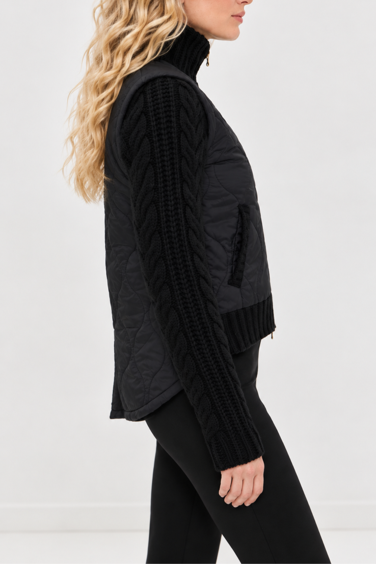 Patra black quilted jacket with wool-blend cable-knit sleeves and high-low hem