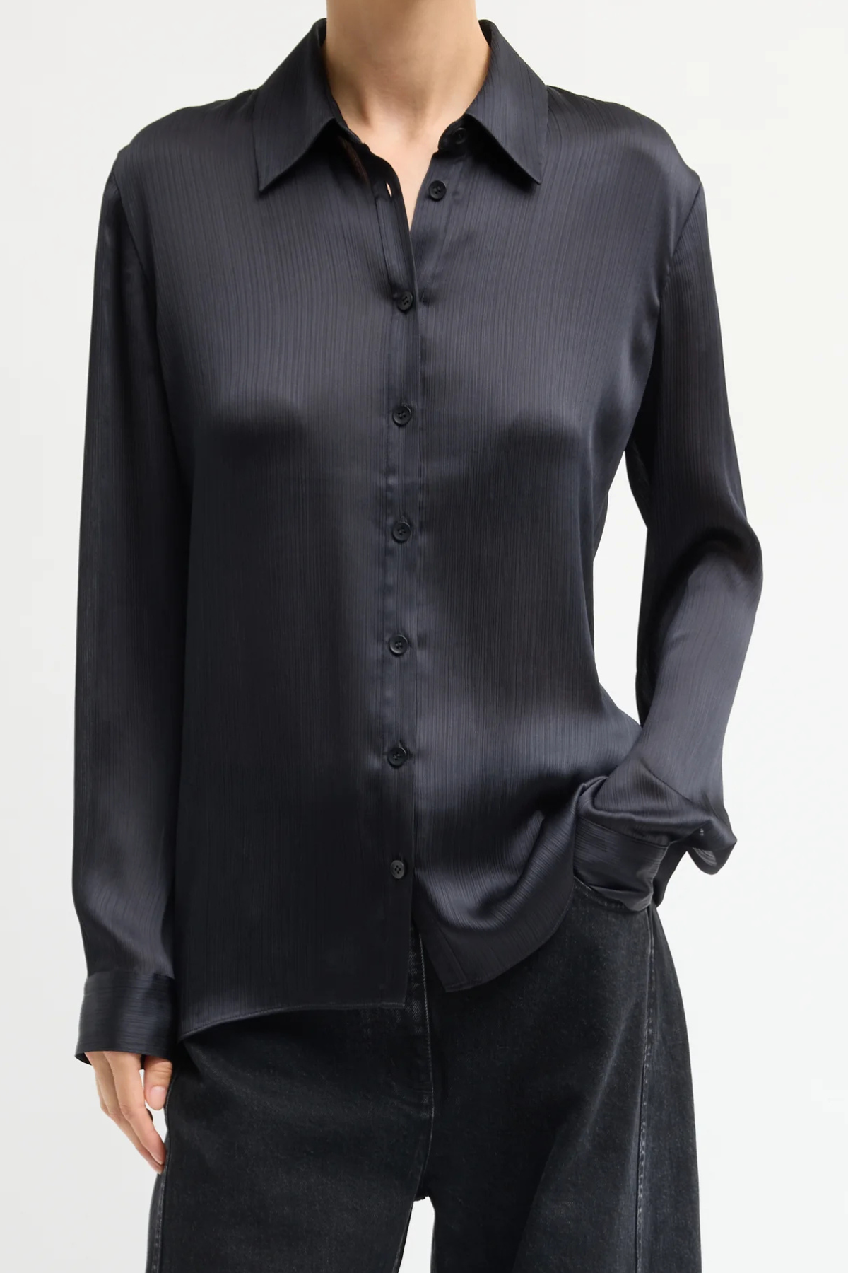 Tibi Matte Satin Plisse Slim Shirt in navy, featuring a slim silhouette and textured pleated matte satin fabric.